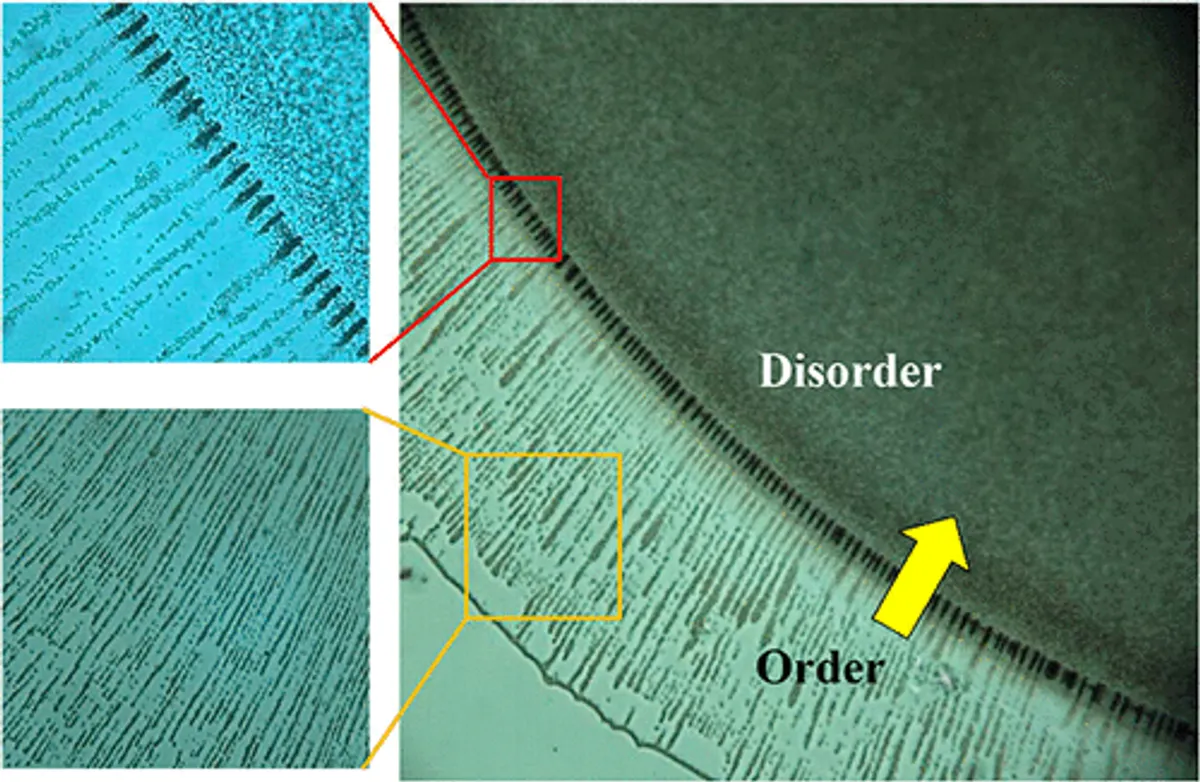 Spatial Ordering of Colloids in a Drying Aqueous Polymer Droplet